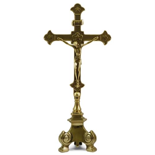 POLISHED BRASS CROSS ON BAROQUE BASE H. 33 CM.