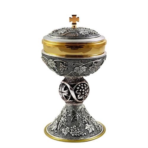ANTIQUED SILVER CIBORIUM WITH GRAPE AND VINE MOTIF